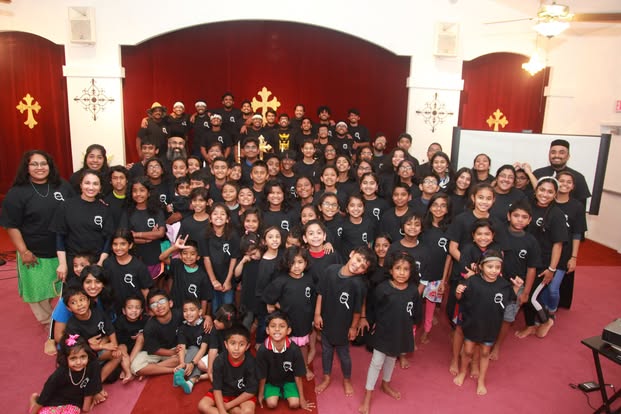 Children, young people, and volunteers gathered at our parish OVBS in 2019